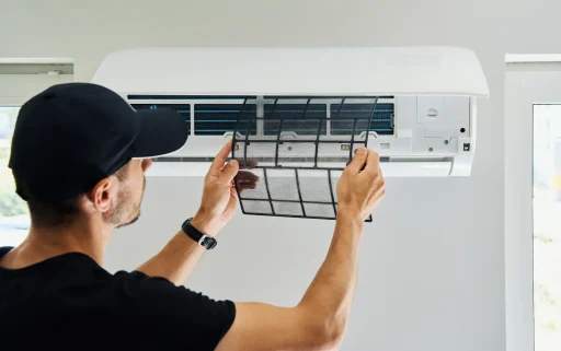 air-conditioner-maintenance-male-technician-repai air-conditioner-maintenance-male-technician-repai